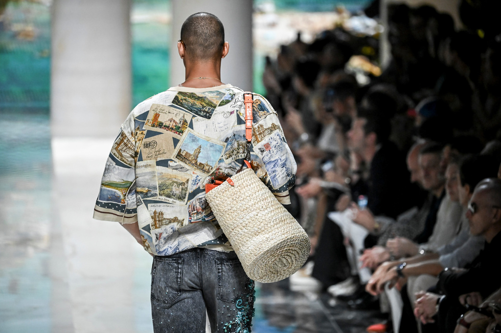 A model wears a creation from the Dolce & Gabbana Spring/Summer 2027 Men's collection presented in Milan, Italy, Saturday, June 20, 2026. (AP Photo/Nicola Marfisi)