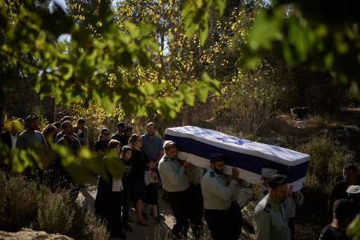 Members of Israeli defense forces carry the coffin of the reservist Master Sergeant Yona Efraim Feldbaum, who was killed in the Gaza Strip, during his funeral at Mount Herzl military cemetery, in Jersualem, Wednesday, Oct. 29, 2025. (AP Photo/Leo Correa) Members of Israeli defense forces carry the coffin of the reservist Master Sergeant Yona Efraim Feldbaum, who was killed in the Gaza Strip, during his funeral at Mount Herzl military cemetery, in Jersualem, Wednesday, Oct. 29, 2025. (AP Photo/Leo Correa)