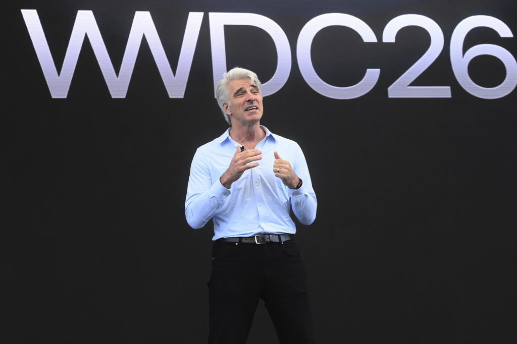 Craig Federighi, Apple's senior vice president of software engineering, speaks during the annual World Wide Developers Conference at Apple's headquarters in Cupertino, Calif., Monday, June 8, 2026. (AP Photo/Noah Berger)