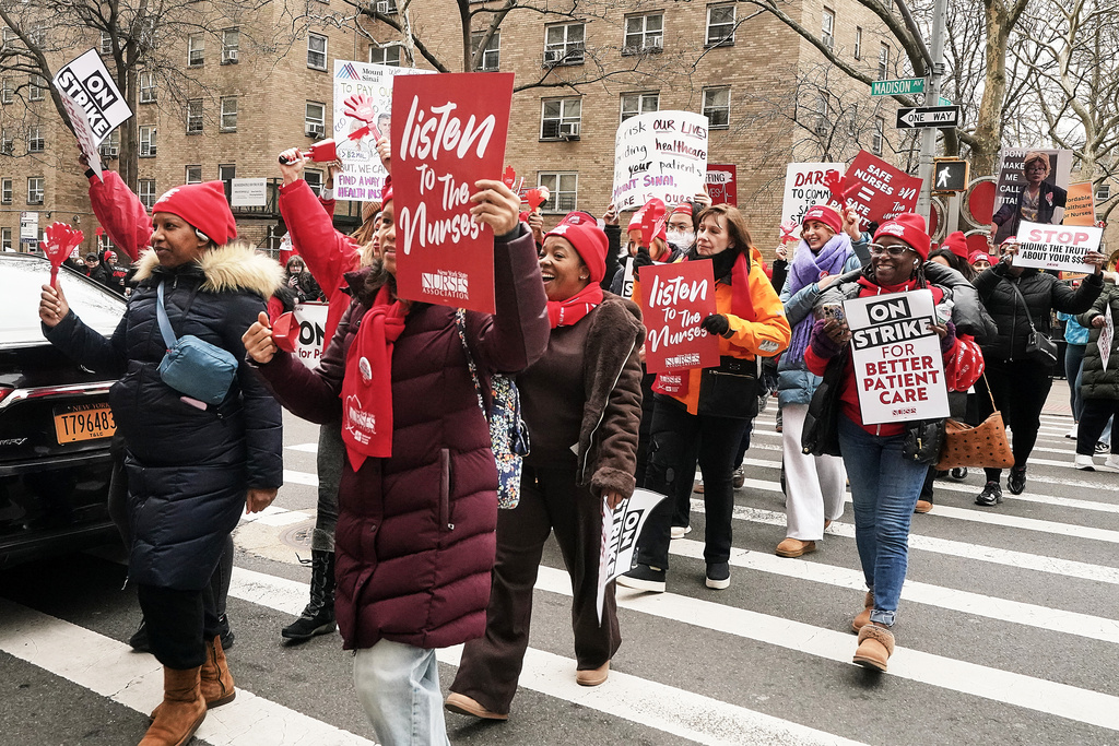 Striking nurses demonstrate outside Mt. Sinai Hospital, in New York, Wednesday, Jan. 14, 2026. (AP Photo/Richard Drew)