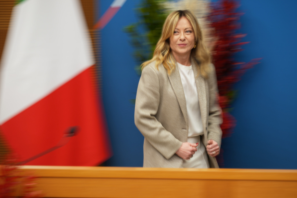 Italian Prime Minister Giorgia Meloni arrives at her annual start-of-the-year press conference in the press room at the Lower Chamber, in Rome, Friday, Jan. 9, 2026. (AP Photo/Andrew Medichini)