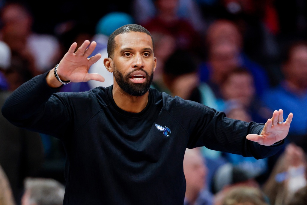 Charlotte Hornets head coach Charles Lee directs his team during the second half of an NBA basketball game against the New Orleans Pelicans in Charlotte, N.C., Monday, Feb. 2, 2026. (AP Photo/Nell Redmond)