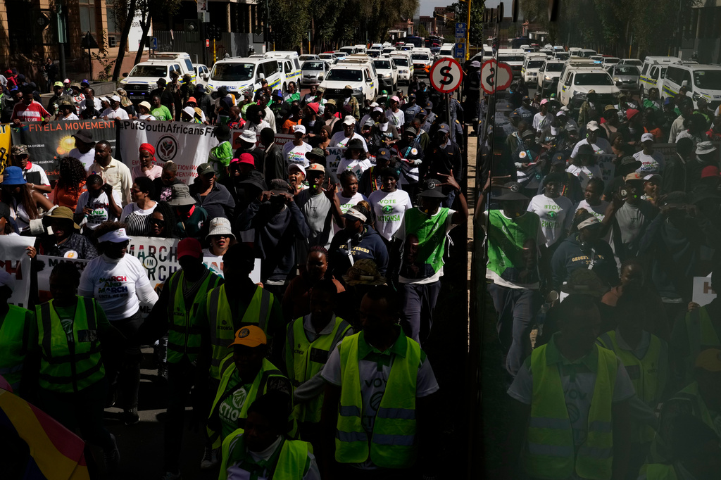 South Africans protest against illegal migration, in Johannesburg, South Africa, Wednesday, April 29, 2026. (AP Photo/Themba Hadebe)