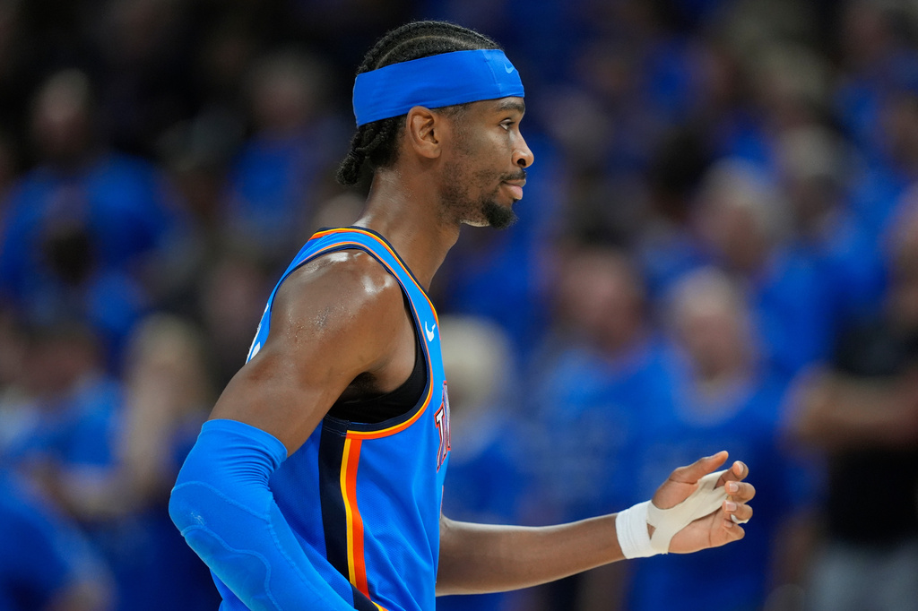 Oklahoma City Thunder guard Shai Gilgeous-Alexander walks back to the team bench during the second half of Game 7 of the Western Conference finals of the NBA basketball playoffs against the San Antonio Spurs, series Saturday, May 30, 2026, in Oklahoma City. (AP Photo/Tony Gutierrez)