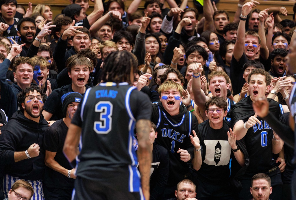Duke's Isaiah Evans (3) celebrates with the student section after a play during the second half of an NCAA college basketball game against Florida in Durham, N.C., Tuesday, Dec. 2, 2025. (AP Photo/Ben McKeown)