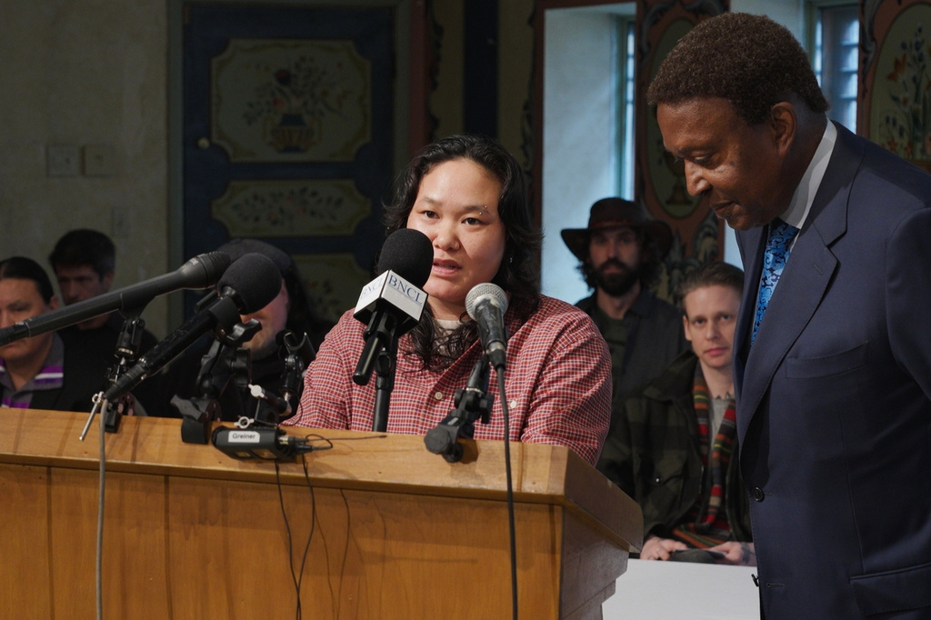 Georgia Savageford recalls watching federal immigration officers fatally shoot Alex Pretti during a news conference Thursday, March 26, 2026, in Minneapolis. (AP Photo/Mark Vancleave)