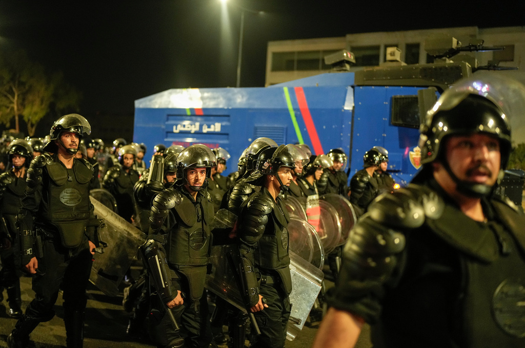 Security forces disperse a gathering as youth led protests calling for healthcare and education reforms turned violent, in Sale, Morocco, Wednesday, Oct. 1, 2025. (AP Photo/Mosa'ab Elshamy)