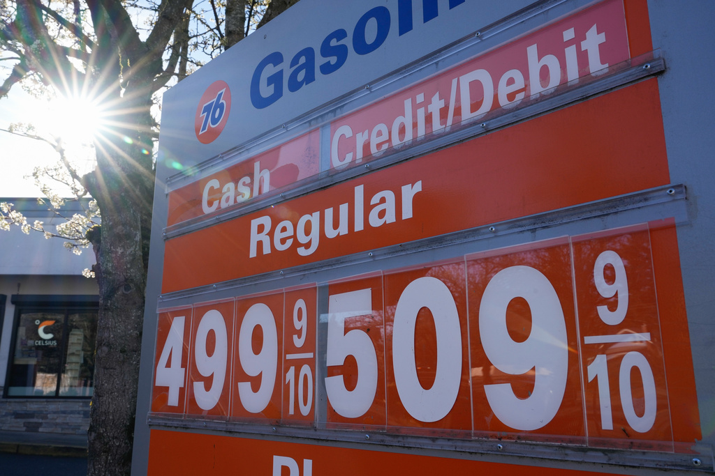 Gasoline prices are displayed at a gas station on Monday, March 16, 2026, in Portland, Ore. (AP Photo/Jenny Kane)