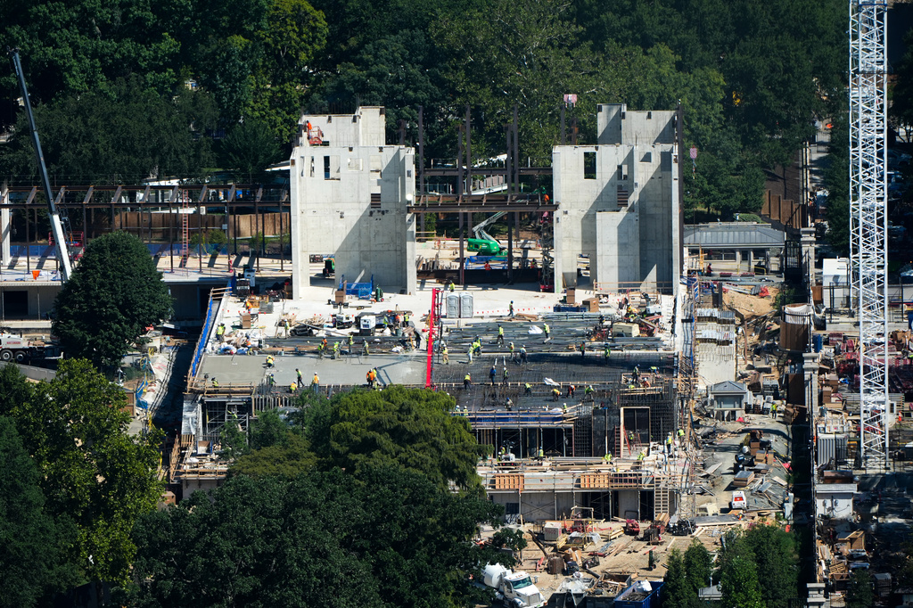 Workers continue construction on the new White House ballroom, as seen from the Washington Monument, Wednesday, Aug. 19, 2026, in Washington. (AP Photo/Alex Brandon)