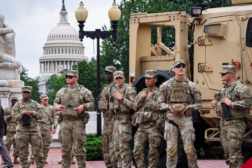 FILE - National Guard troops congregate at the entrance to Union Station in Washington, Aug. 20, 2025. (AP Photo/J. Scott Applewhite, FIle) FILE - National Guard troops congregate at the entrance to Union Station in Washington, Aug. 20, 2025. (AP Photo/J. Scott Applewhite, FIle)