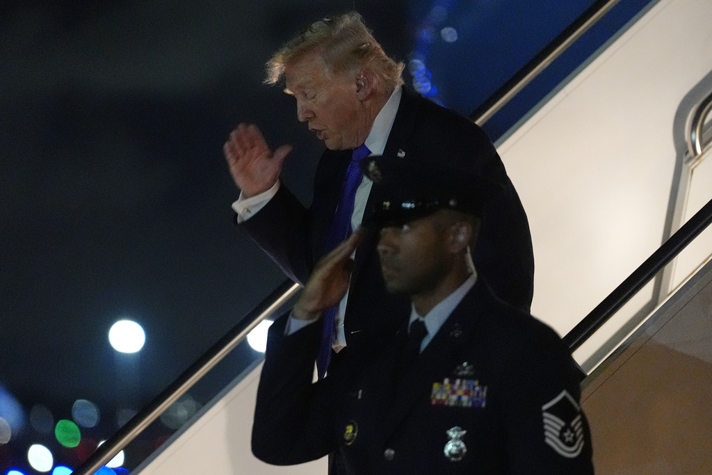 President Donald Trump arrives on Air Force One at Palm Beach International Airport, Friday, Jan. 9, 2025, in West Palm Beach, Fla. (AP Photo/Julia Demaree Nikhinson)