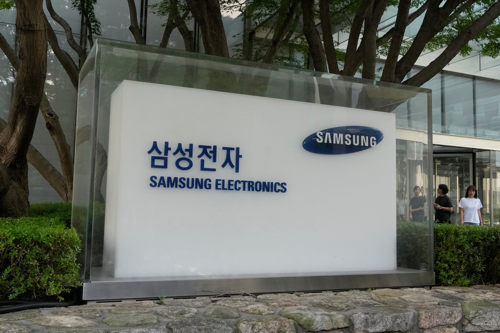 The logo of the Samsung Electronics Co. is seen at its office in Seoul, South Korea, Thursday, July 30, 2026. (AP Photo/Ahn Young-joon)