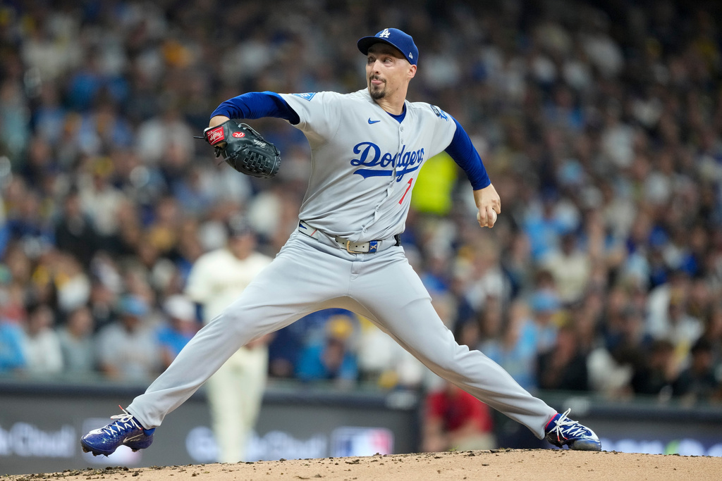 Los Angeles Dodgers pitcher Blake Snell throws against the Milwaukee Brewers during the second inning in Game 1 of baseball's National League Championship Series, Monday, Oct. 13, 2025, in Milwaukee. (AP Photo/Brynn Anderson)