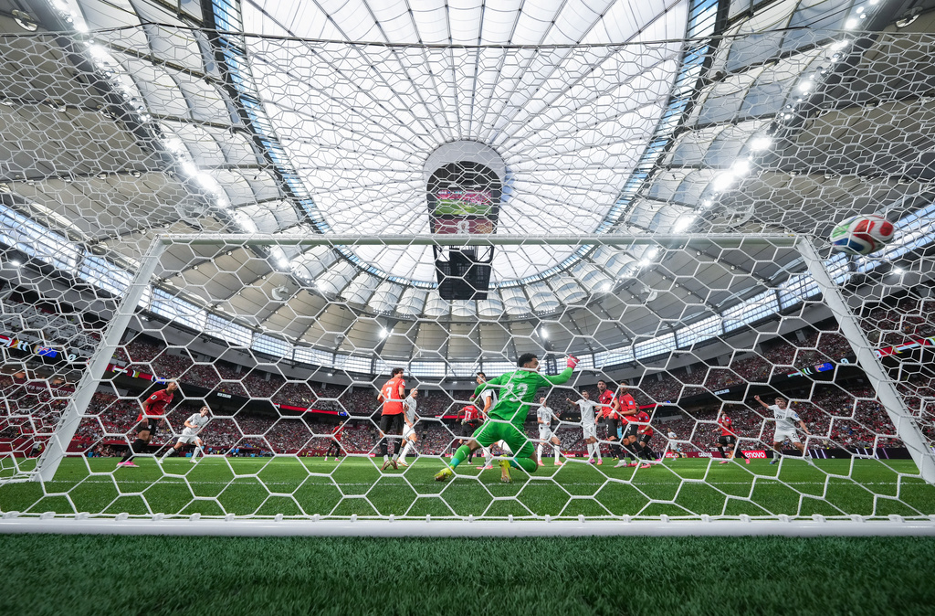 Egypt goalkeeper Mostafa Shoubir (23) allows a goal to New Zealand's Finn Surman, not seen, during the first half of the World Cup Group G soccer match in Vancouver, British Columbia, Sunday, June 21, 2026. (Darryl Dyck/The Canadian Press via AP)