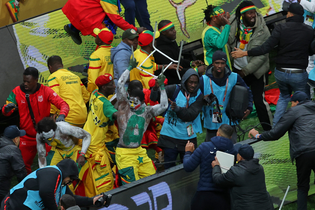 Senegal supporters protest after a controversial penalty was awarded to Morocco late on during the Africa Cup of Nations final soccer match between Senegal and Morocco in Rabat, Morocco, Sunday, Jan. 18, 2026. (AP Photo/Youssef Loulidi)