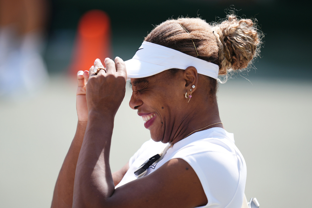 Serena Williams of the U.S. reacts during a practice session, ahead of the Wimbledon Tennis Championships, at the All England Lawn Tennis and Croquet Club, in London, Saturday June 27, 2026. (John Walton/PA via AP)