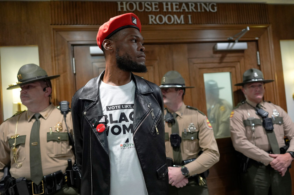 Deonte Williams stands outside a House committee hearing room after it was cleared by state trooper during a special session of the state legislature to redraw U.S. Congressional voting maps Wednesday, May 6, 2026, in Nashville, Tenn. (AP Photo/George Walker IV)