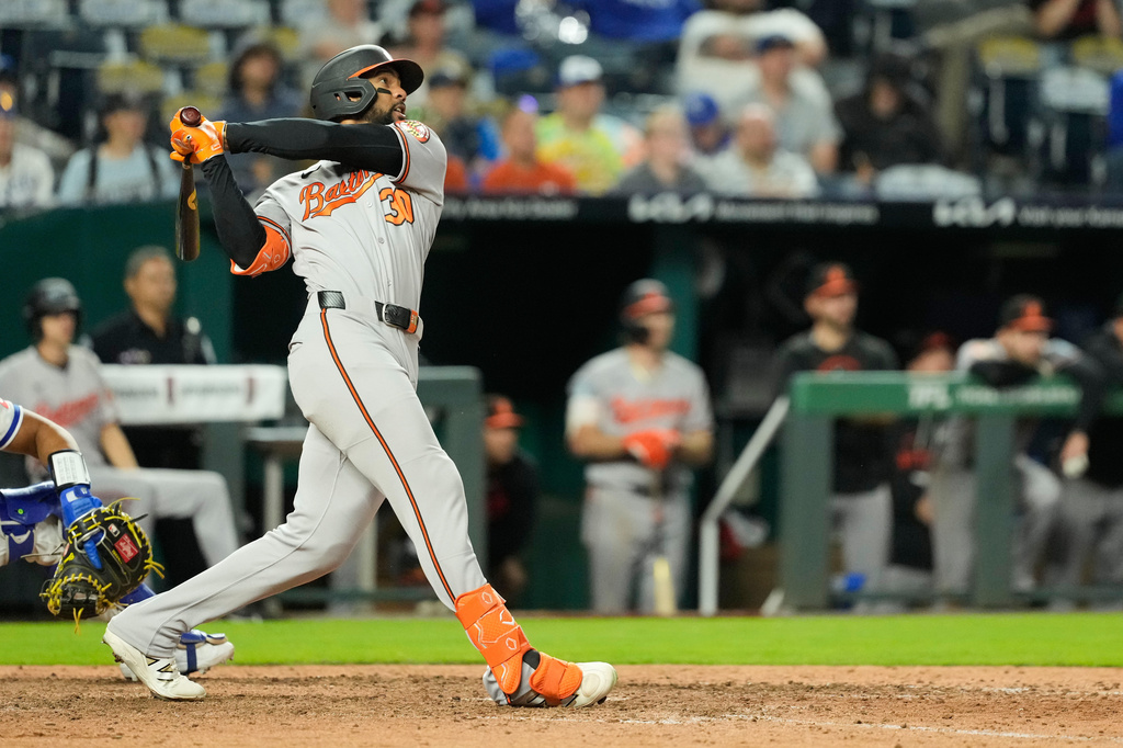 Baltimore Orioles' Leody Taveras watches his grand slam during the 12th inning of a baseball game against the Kansas City Royals, Monday, April 20, 2026, in Kansas City, Mo. (AP Photo/Charlie Riedel)