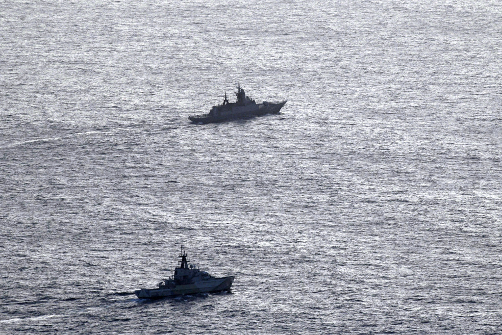 In this undated aerial photo released by the United Kingdom Ministry of Defence, HMS Severn, lower section, is seen tracking the Russian corvette RFN Stoikiy off the UK coast. (United Kingdom Ministry of Defence via AP)