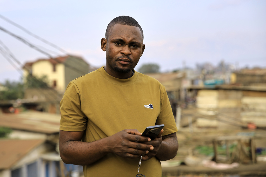 Vianney Kambale Kombi, an Ebola survivor, poses for a photo in Beni, Congo, Sunday, May 31, 2026. (AP Photo/Kitsa Musayi Sebastien)