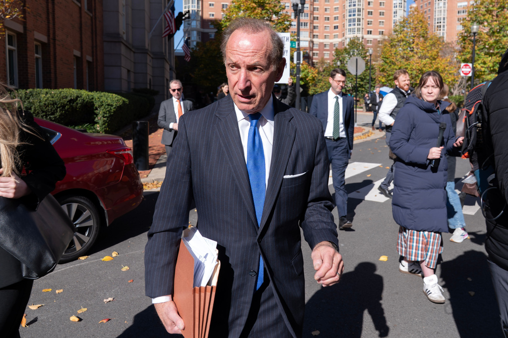 Former FBI Director James Comey's attorney Abbe Lowell talks to reporters as he leaves the federal courthouse in Alexandria, Va., Thursday, Nov. 13, 2025. (AP Photo/Jose Luis Magana)