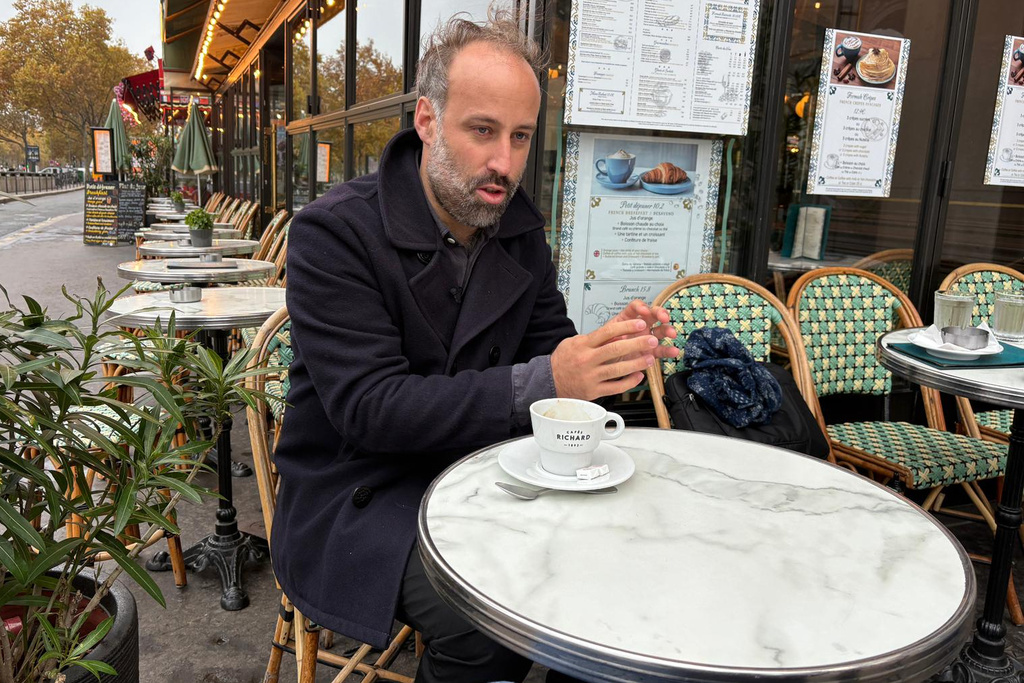 President of victims' association Life for Paris, Arthur Denouveaux answers the Associated Press, Friday, Nov.7, 2025 in Paris. (AP Photo/Nicolas Garriga)