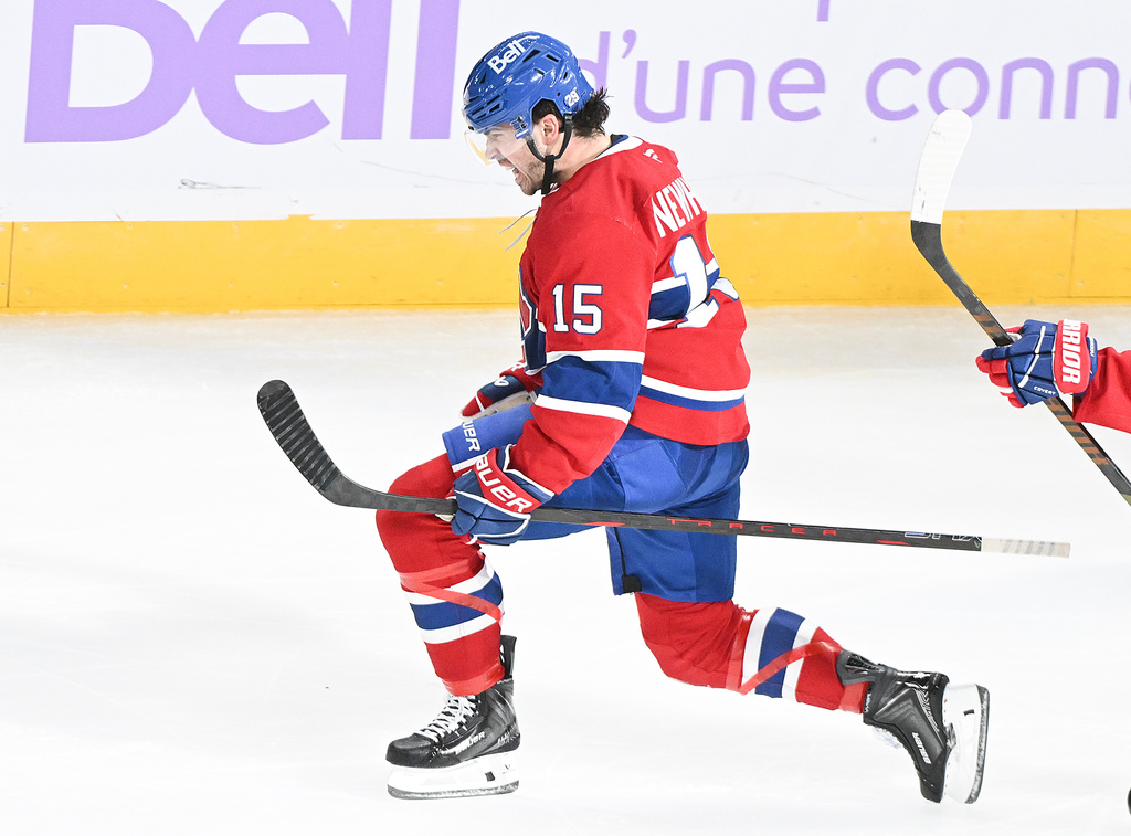 Montreal Canadiens' Alex Newhook (15) celebrates after scoring against the Utah Mammoth during second period NHL hockey action in Montreal, Saturday, Nov. 8, 2025. (Graham Hughes/The Canadian Press via AP)