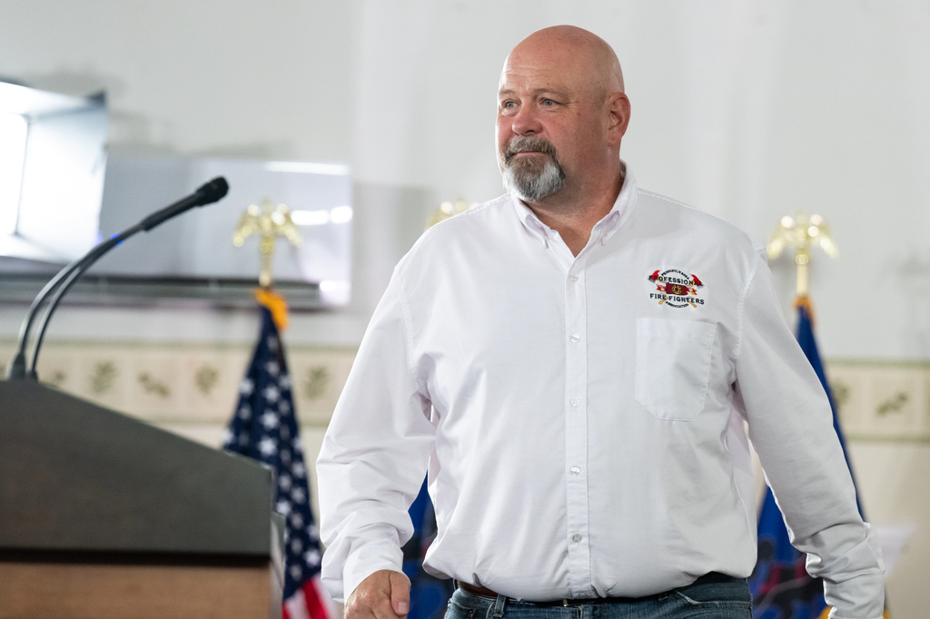 Democratic congressional candidate Bob Brooks takes the stage during a campaign event for his congressional bid ahead of the midterm elections at a Steelworkers Union Hall in Bethlehem, Pa., Sunday, July 26, 2026. (AP Photo/Erin Blewett)
