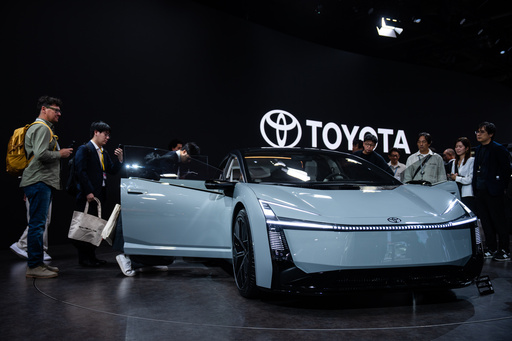 Members of the media and guests look at Toyota's Corolla concept during the press day of the Japan Mobility Show, in Tokyo, Thursday, Oct. 30, 2025. (AP Photo/Louise Delmotte) Members of the media and guests look at Toyota's Corolla concept during the press day of the Japan Mobility Show, in Tokyo, Thursday, Oct. 30, 2025. (AP Photo/Louise Delmotte)