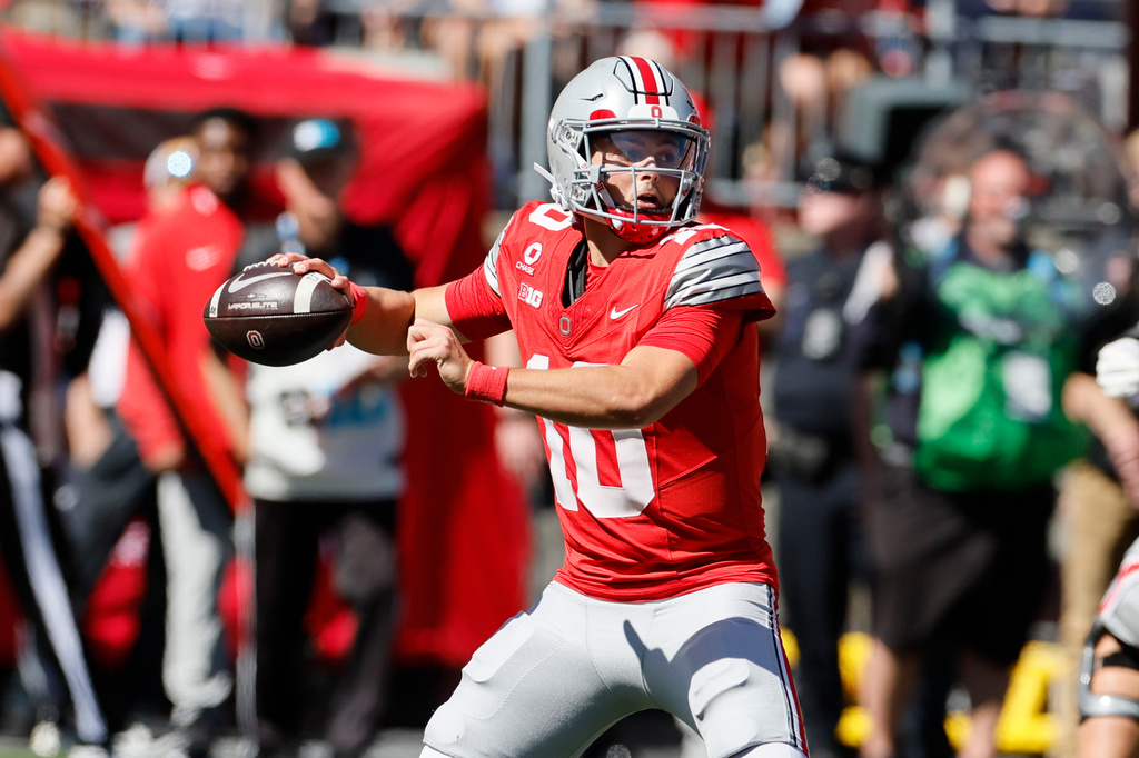 Ohio State quarterback Julian Sayin throws a pass during the first half of an NCAA college football game against Illinois, Saturday, Sept. 26, 2026, in Columbus, Ohio. (AP Photo/Jay LaPrete)