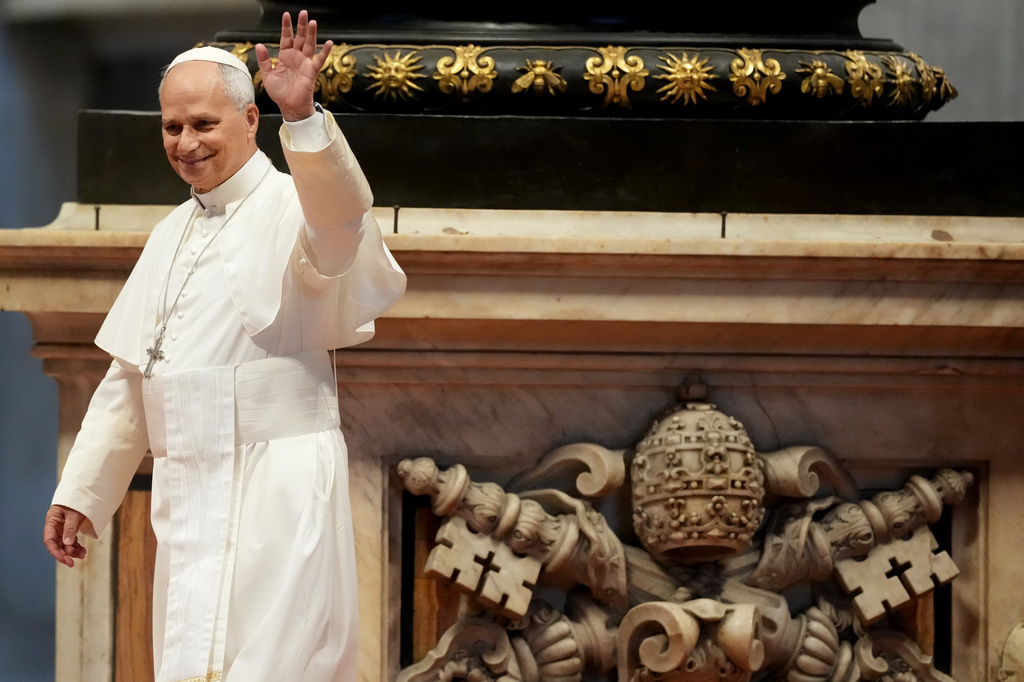 Pope Leo XIV waves to faithful on the occasion of the weekly general audience in St. Peter's Basilica, at the Vatican, Wednesday, Aug. 5, 2026. (AP Photo/Gregorio Borgia)