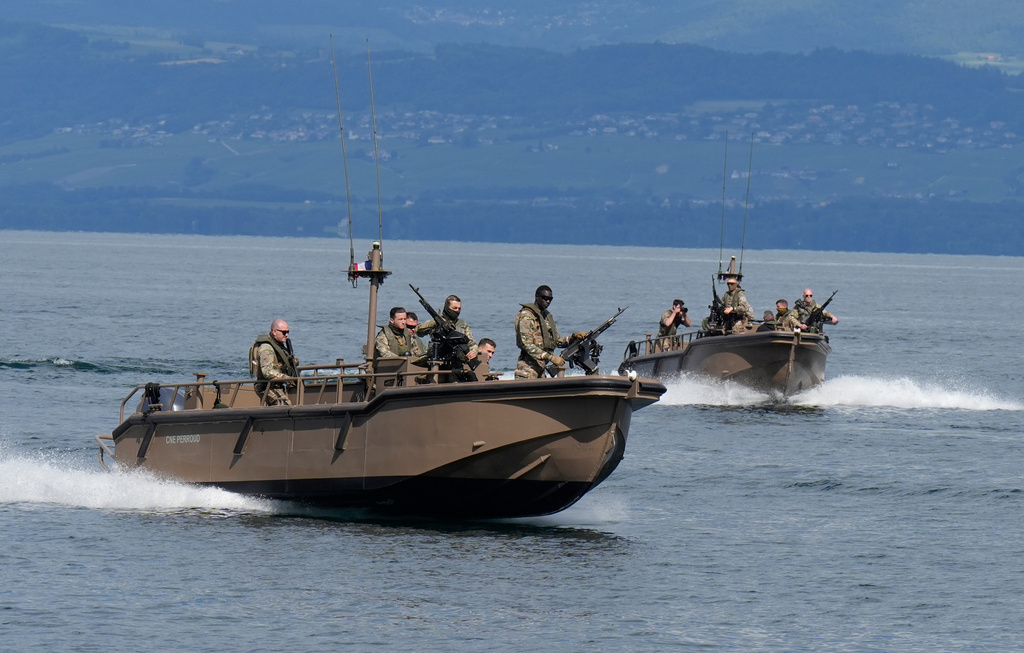 French military boats patrol Lake Geneva in Evian-les-Bains, eastern France, Thursday, June 11, 2026, ahead of the G7 summit scheduled to take place June 15-17. (AP Photo/Baz Ratner)