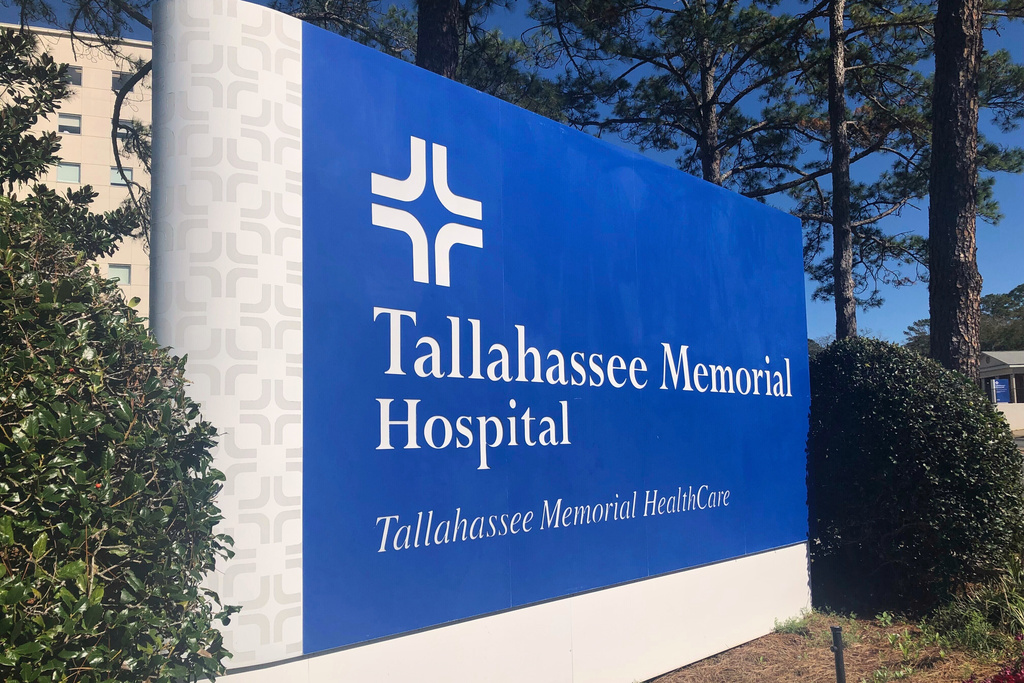 FILE - A sign is seen outside Tallahassee Memorial Hospital on Feb. 3, 2023, in Tallahassee, Fla. (AP Photo/Anthony Izaguirre, File)