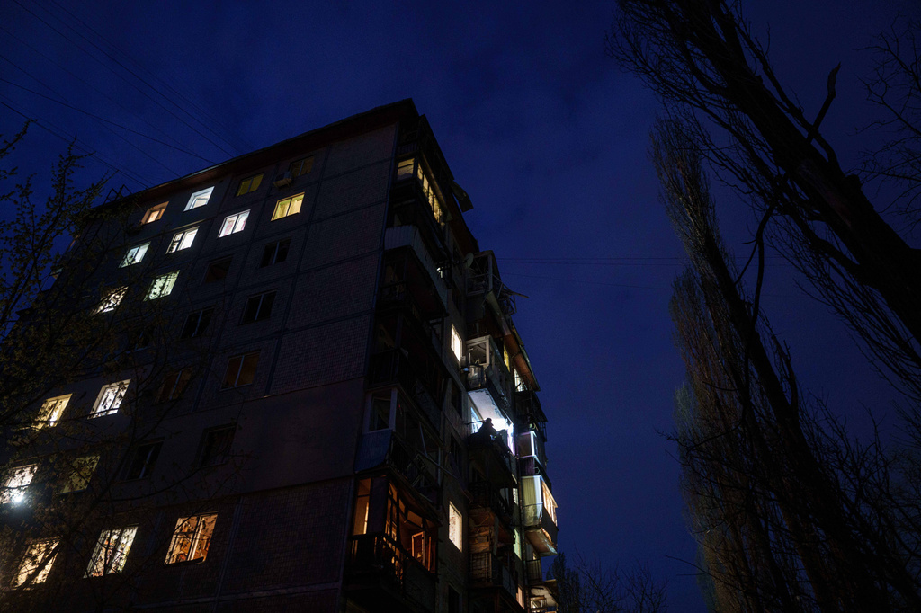 Rescue workers clear the rubble of a house damaged after a Russian strike on residential area in Kyiv, Ukraine, on Thursday, April 16, 2026. (AP Photo/Evgeniy Maloletka)