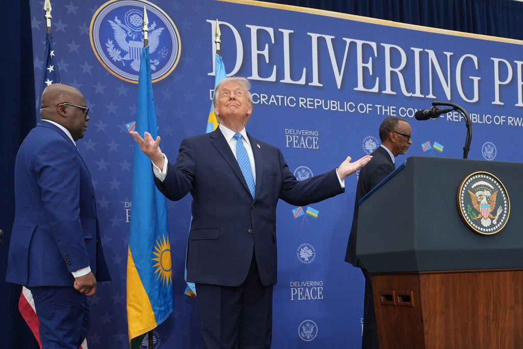 President Donald Trump arrives for a signing ceremony with Rwanda's President Paul Kagame and Democratic Republic of Congo President Felix-Antoine Tshisekedi at the U.S. Institute of Peace, Thursday, Dec. 4, 2025, in Washington. (AP Photo/Evan Vucci)