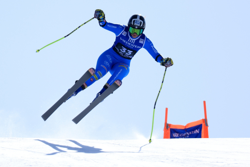 Italy's Asja Zenere is airborne during an alpine ski, women's World Cup super-G, in Val di Fassa, Italy, Sunday, March 8, 2026. (AP Photo/Luciano Bisi)