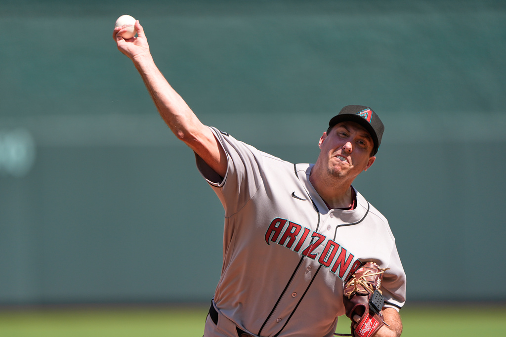 Arizona Diamondbacks starting pitcher Derek Law throws during the first inning of a baseball game against the Kansas City Royals, Monday, Sept. 7, 2026, in Kansas City, Mo. (AP Photo/Charlie Riedel)