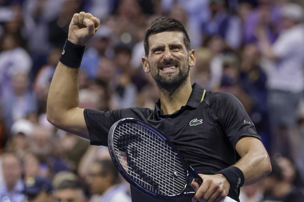 Novak Djokovic, of Serbia, reacts after defeating Jan-Lennard Struff, of Germany, during the fourth round of the US Open tennis championships, Sunday, Aug. 31, 2025, in New York. (AP Photo/Adam Hunger)
