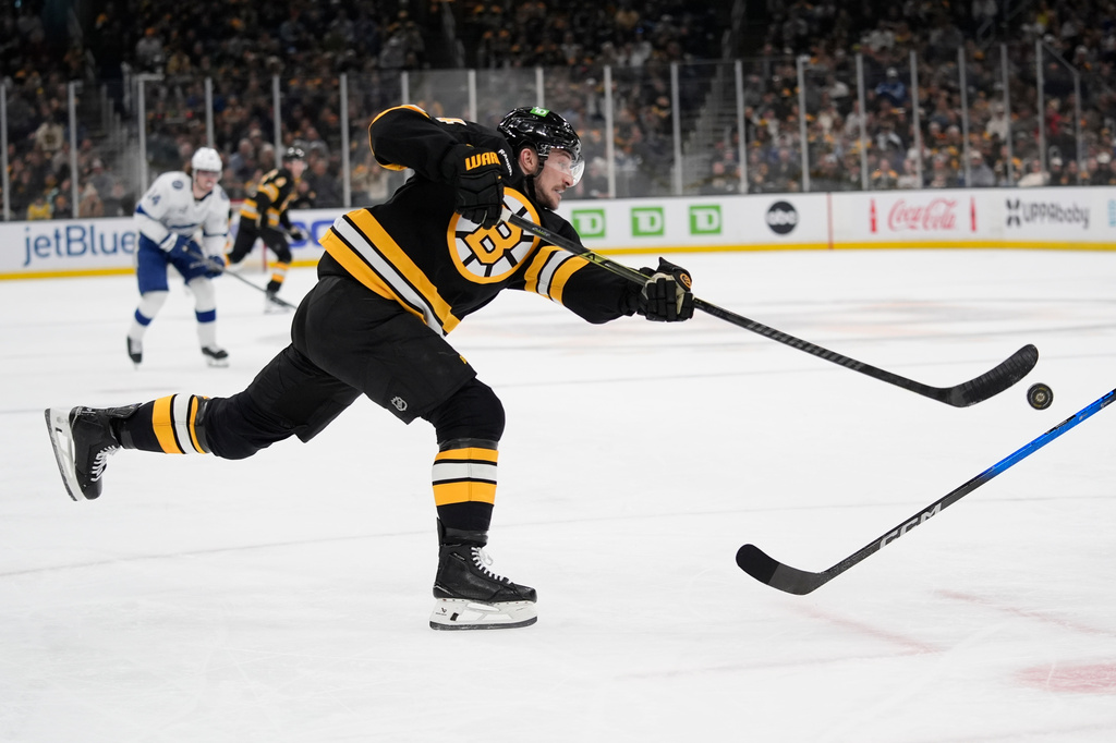 Boston Bruins left wing Tanner Jeannot shoots against the Tampa Bay Lightning during the first period of an NHL hockey game, Saturday, April 11, 2026, in Boston. (AP Photo/Robert F. Bukaty)