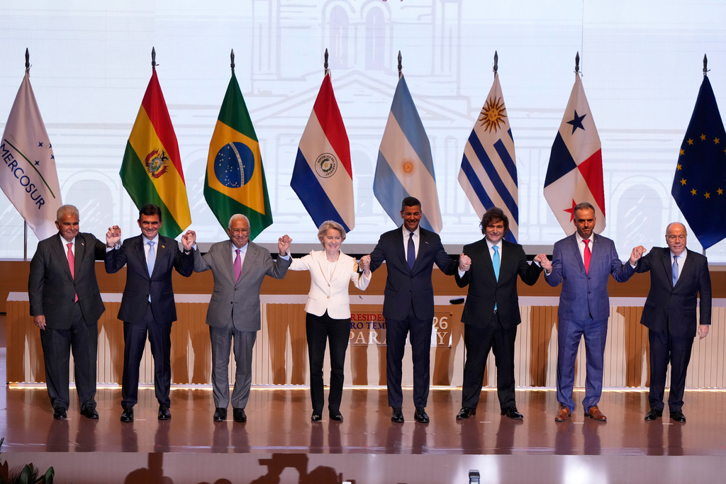 Panama's President Jose Raul Mulino, from left, Bolivian President Rodrigo Paz, European Council President Antonio Costa, European Commission President Ursula von der Leyen, Paraguay's President Santiago Pena, Argentina's President Javier Milei, Uruguay's President Yamandu Orsi and Brazilian Minister of Foreign Affairs Mauro Vieira, pose for a group photo during a meeting to sign a free trade deal between the European Union and Mercosur in Asuncion, Paraguay, Saturday, Jan. 17, 2026. (AP Photo/Jorge Saenz)
