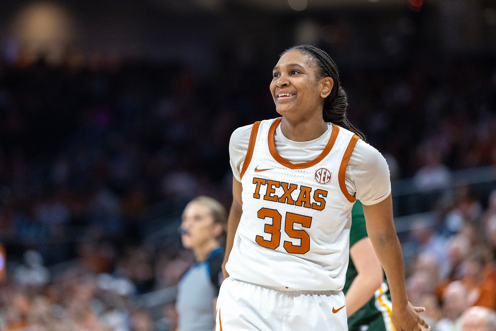 Texas forward Madison Booker (35) reacts during the second half of an NCAA college basketball game against Southeastern Louisiana, Sunday, Dec. 28, 2025, in Austin, Texas. (AP Photo/Stephen Spillman)