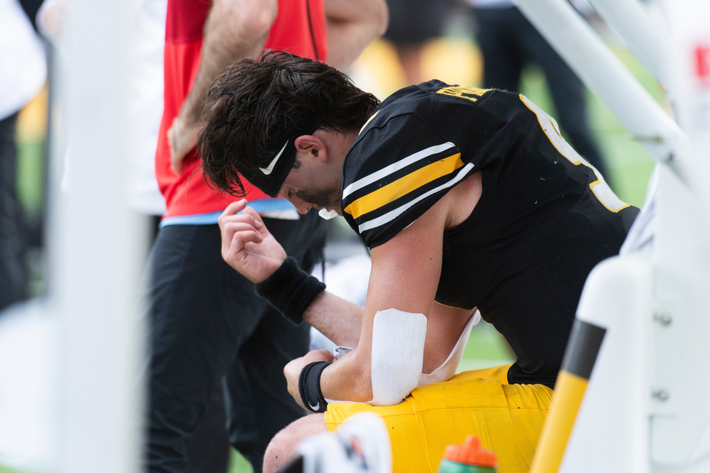 Missouri quarterback Beau Pribula sits on the bench after he threw an interception in the final minute of their loss to Alabama in an NCAA college football game Saturday, Oct. 11, 2025, in Columbia, Mo. (AP Photo/L.G. Patterson)