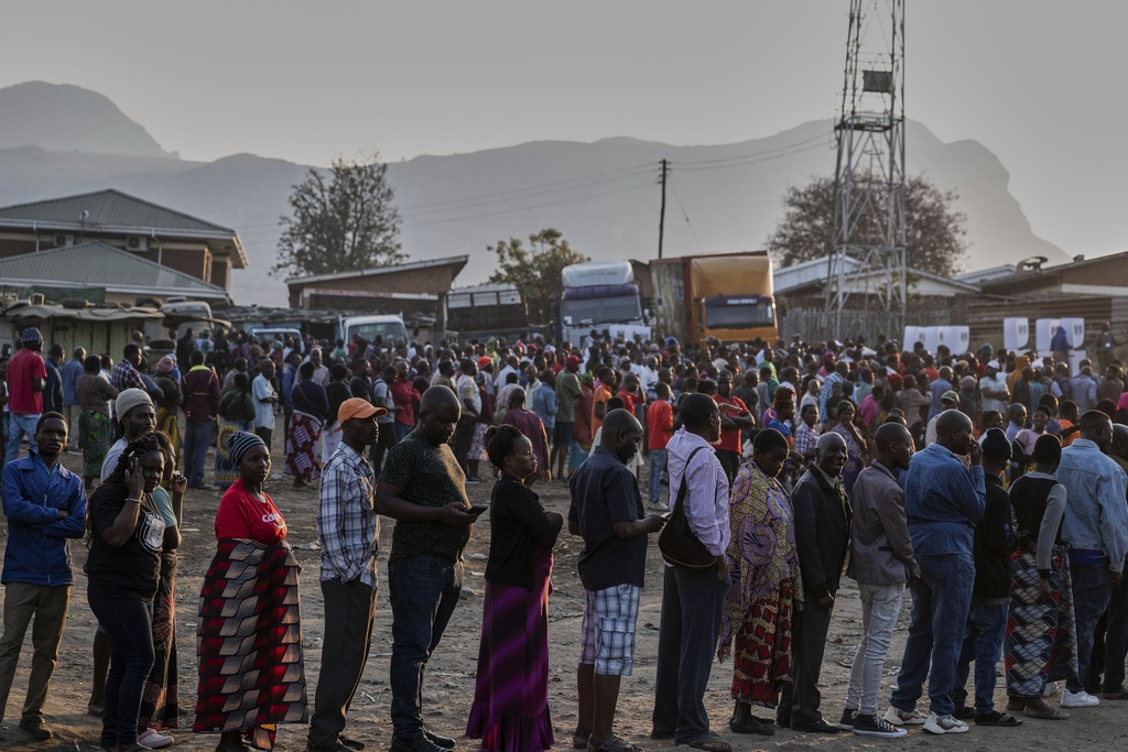 People line up to cast their votes in Blantyre, Malawi, Tuesday, Sept. 16, 2025. (AP Photo/Thoko Chikondi)