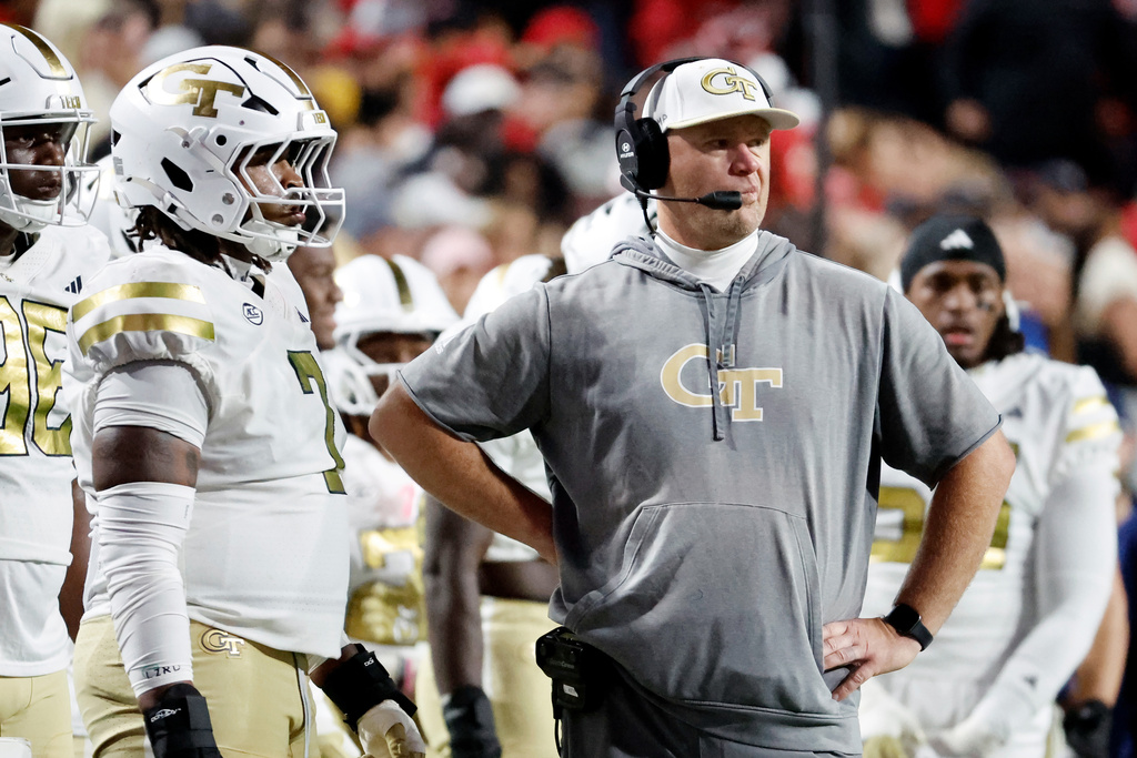 Georgia Tech head coach Brent Key walks the sideline during the first half of an NCAA college football game against North Carolina State in Raleigh, N.C., Saturday, Nov. 1, 2025. (AP Photo/Karl DeBlaker)