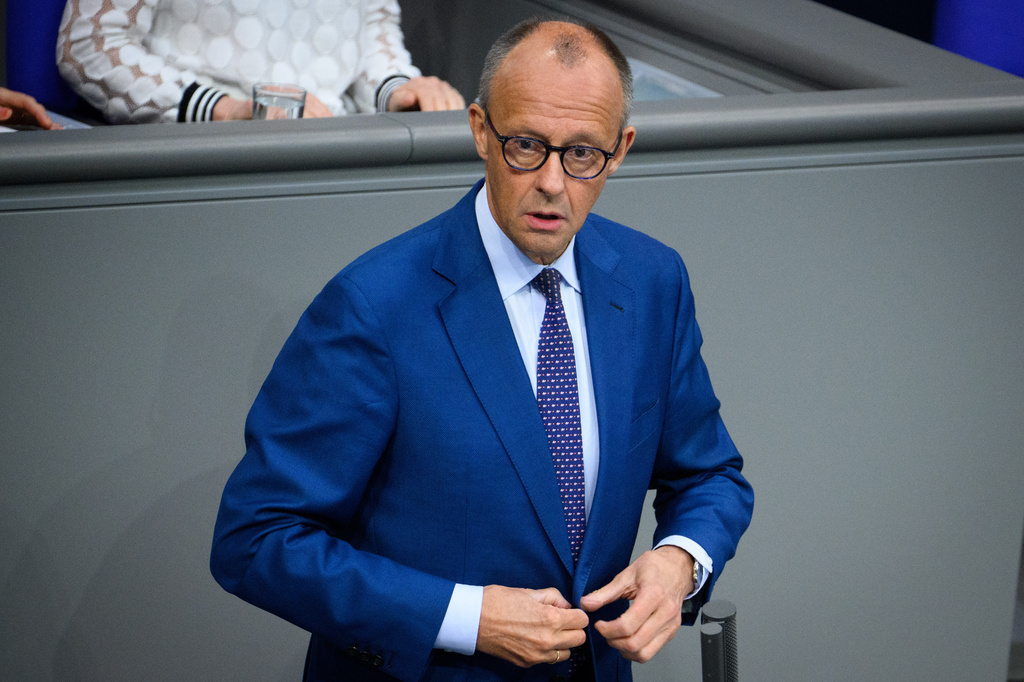 German Chancellor Friedrich Merz delivers a government statement on the current political situation during the 89th plenary session of the 21st legislative period in the German Bundestag, Thursday, July 9, 2026. (Bernd von Jutrczenka/dpa via AP)