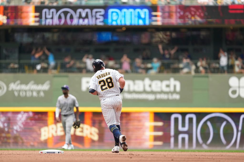 Milwaukee Brewers' Andrew Vaughn (28) rounds the bases after hitting a solo home run during the sixth inning of a baseball game against the Colorado Rockies, Sunday, July 26, 2026, in Milwaukee. (AP Photo/Aaron Gash)