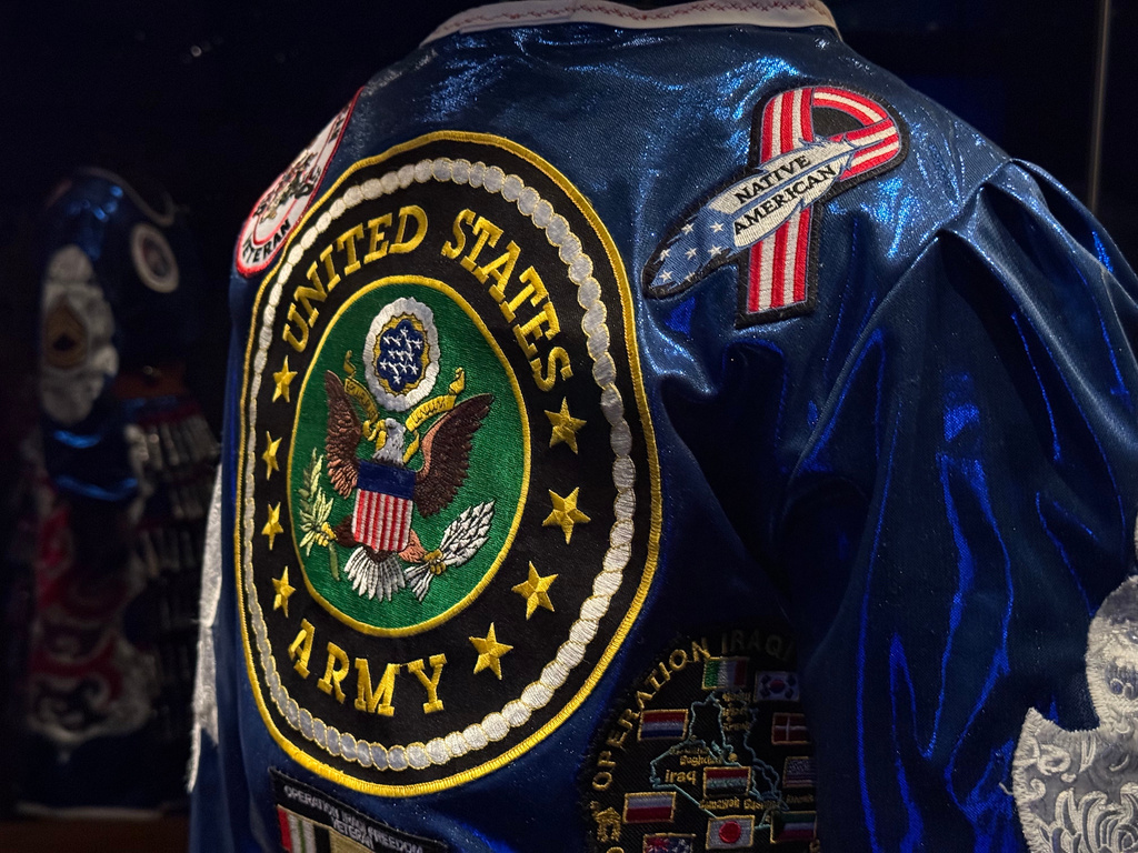 A contemporary color guard dress worn by members of the Native American Women Warriors is displayed at the Smithsonian's National Museum of the American Indian in Washington, on Saturday, May 23, 2026. (Jourdan Bennett-Begaye/ICT via AP)