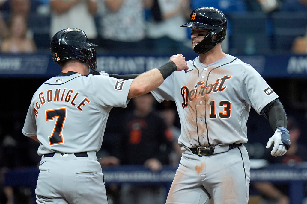 Detroit Tigers' Dillon Dingler (13) celebrates with Kevin McGonigle (7) after Dingler hit a two-run home run off Tampa Bay Rays pitcher Griffin Jax during the third inning of a baseball game Monday, June 1, 2026, in St. Petersburg, Fla. (AP Photo/Chris O'Meara)
