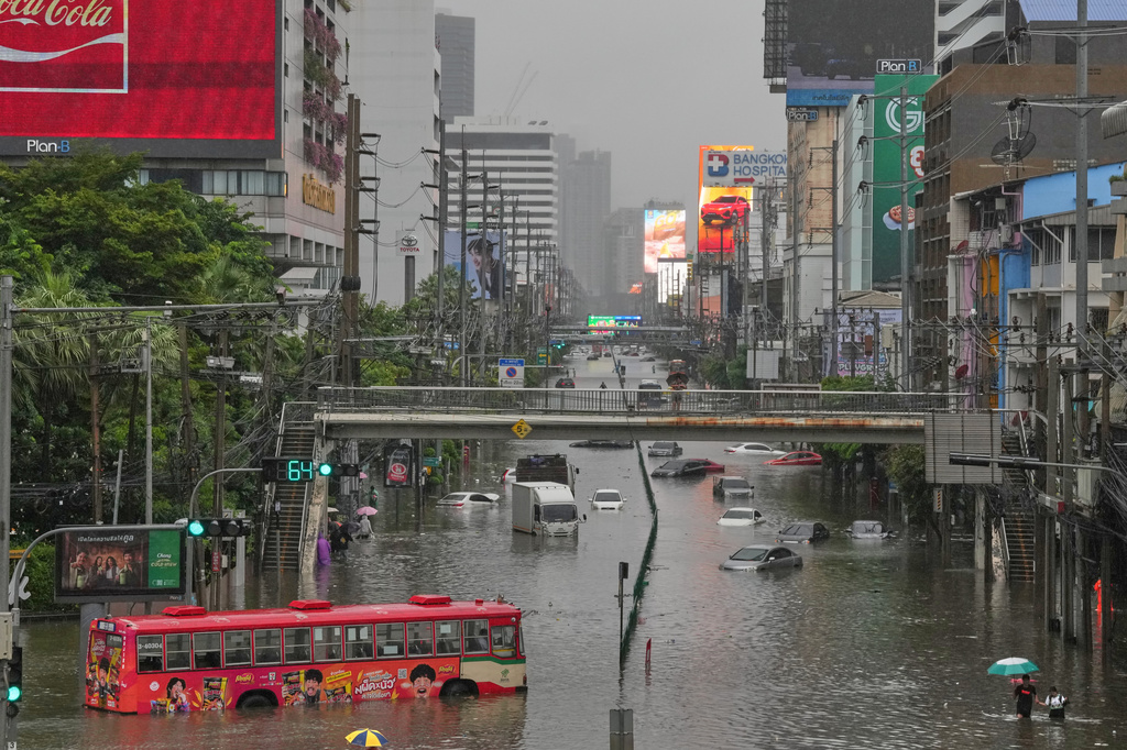 The streets are flooded after heavy rain in Bangkok, Thailand, Saturday, Sept. 26, 2026. (AP Photo/Sakchai Lalit)