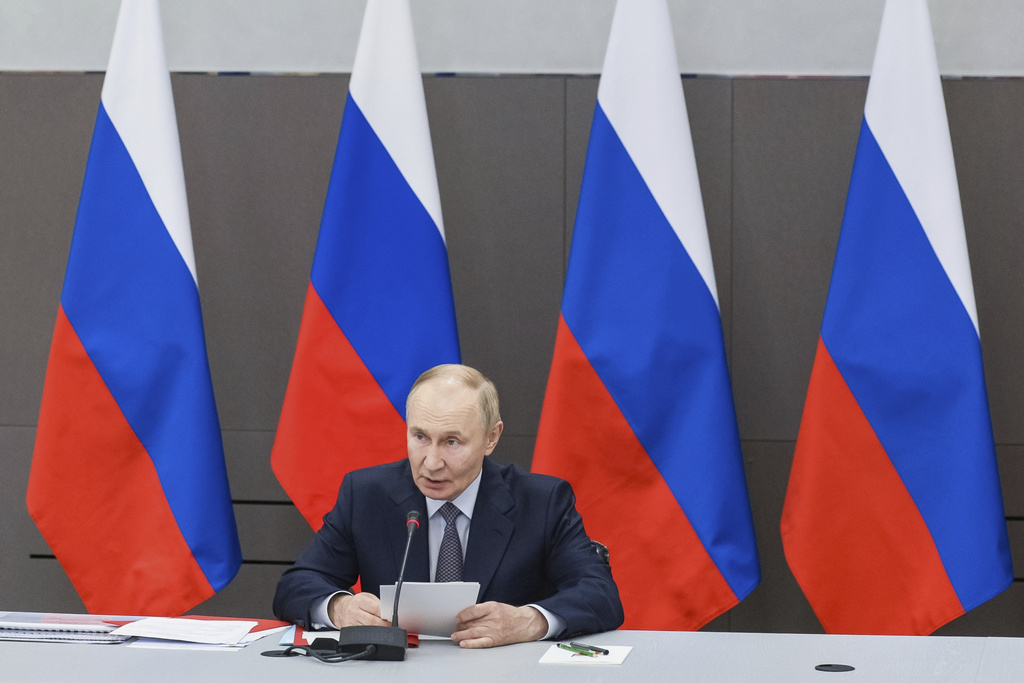 Russian President Vladimir Putin chairs a meeting of the Military-Industrial Commission in Perm, Russia, Friday, Sept. 19, 2025. (Gavriil Grigorov, Sputnik, Kremlin Pool Photo via AP)